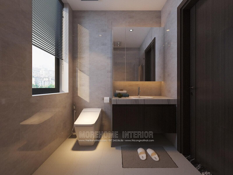 Tủ phòng tắm sẫm màu kết hợp cùng mặt bàn đá lavabor cùng bố trí hiện đại giúp cho phòng tắm nhỏ trở nên đẹp, sang trọng và đầy tiện ghi. Mẫu nội thất chung cư