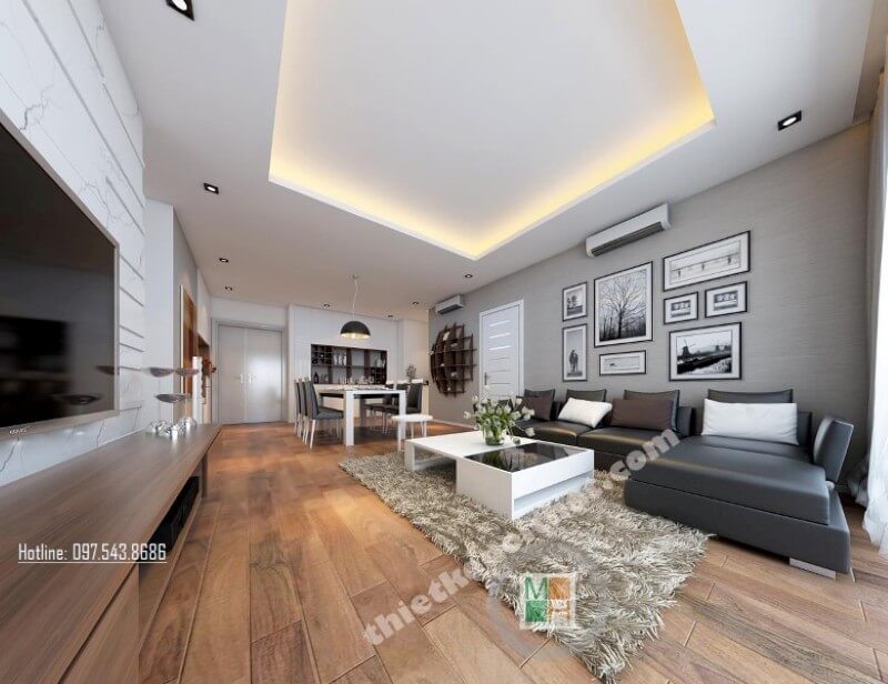 Khu vực phòng khách được sắp xếp hài hòa, khéo léo, 2 tone màu trắng và đen đóng vai trò chủ đạo được kiến trúc sư lồng ghép tinh tế mang lại không gian tiếp khách thêm phần sang trọng hơn Thiết kế chung cư