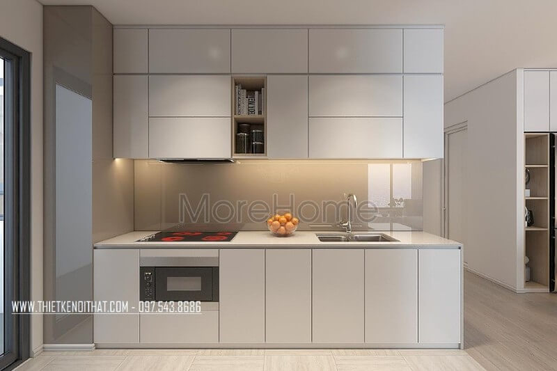 Mẫu tủ bếp kiểu dáng chữ i gỗ công nghiệp màu trắng kết hợp phân chia các ngăn tủ một cách hợp lí, tạo cho người nội trợ thuận tiện hơn trong quá trình mang lại những bữa cơm ngon miệng cho những người thân yêu của mình Tủ bếp đẹp