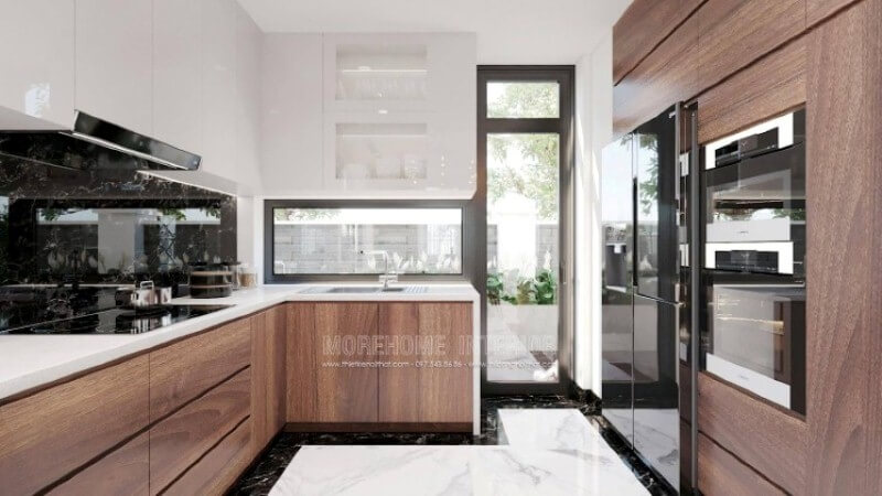 Nếu bạn đã được xem các mẫu tủ bếp đẹp có tay nắm, thì có thể những mẫu tủ bếp đó đã lỗi thời, thiết kế phòng bếp với toàn bộ bề mặt cánh tủ trơn nhẵn là một sự thay thế hoàn hảo, ko chút tay cầm nhưng lại kéo đẩy dễ dàng nhờ ý tưởng thiết kế vát từ cánh tủ giúp bề mặt gọn gàng mà đẹp mắt. Tủ bếp hiện đại đẹp